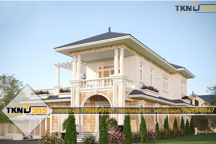 Biệt thự 2 tầng tân cổ điển gây ấn tượng với hệ cột đối xứng, phào chỉ tinh gọn và các mảng ốp đá tạo chiều sâu cho mặt tiền