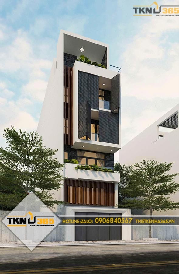 Mặt tiền nhà phố 6 tầng sử dụng hình khối hiện đại kết hợp hệ lam chắn nắng và ban công xanh tạo nên tổng thể sang trọng, thanh thoát