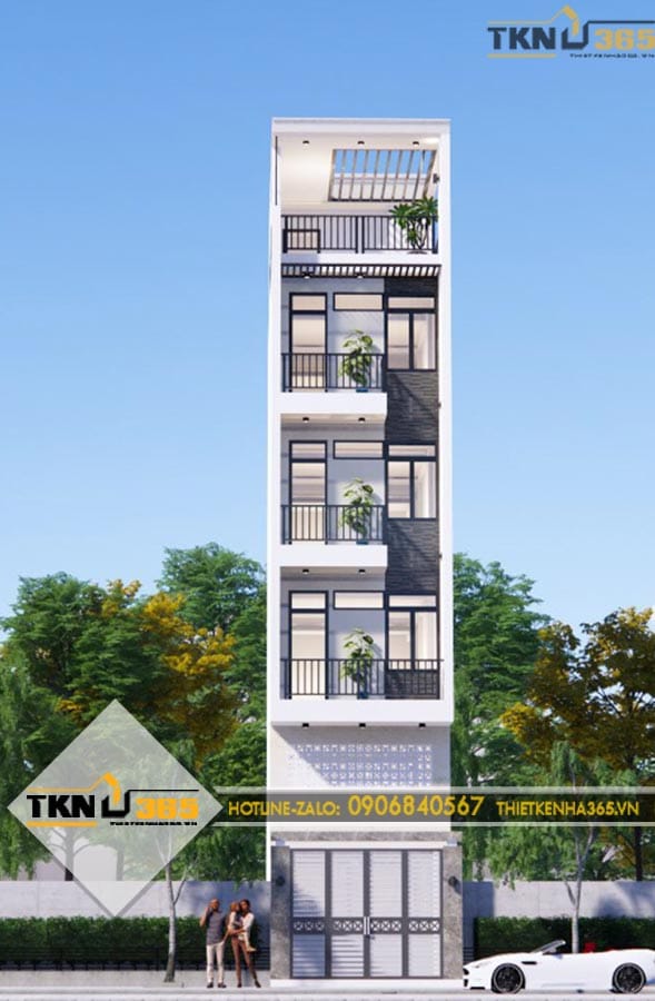 Mặt tiền nhà phố 5 tầng sử dụng gam màu trắng chủ đạo, điểm nhấn là mảng ốp màu tối cùng hệ lan can sắt thanh mảnh
