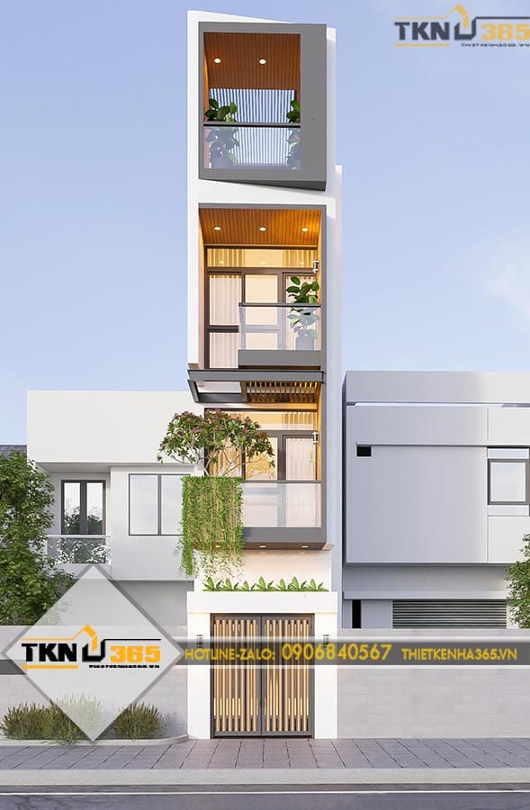 Mặt tiền nhà phố 4 tầng sử dụng hình khối tối giản, hệ cửa kính lớn và các khoảng ban công giúp mở rộng không gian theo chiều cao