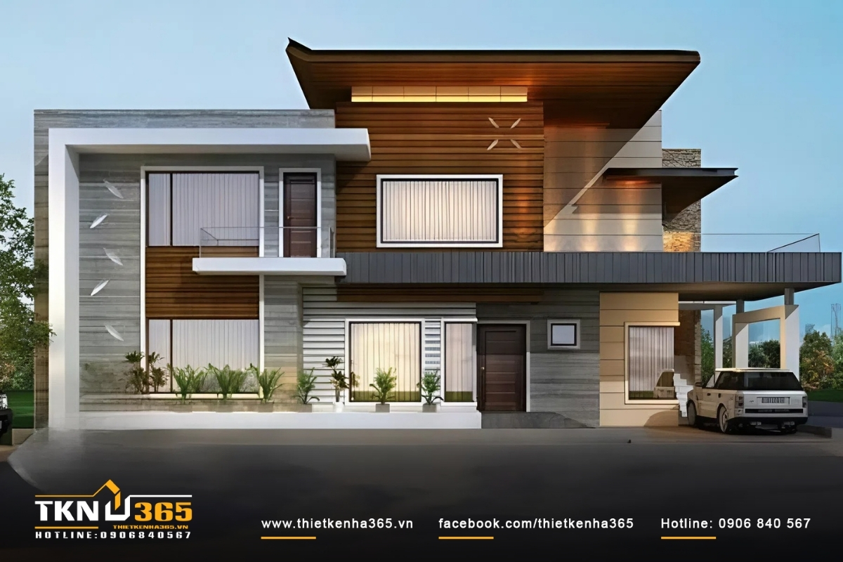 50+ Mẫu thiết kế nhà 2 mặt tiền kinh doanh đẹp, hiện đại 14 Ngôi nhà ống 2 tầng 2 mặt tiền tận dụng ban công, cửa sổ kính và mái nhà cao hơn để làm mát và tránh cảm giác hầm nóng vào mùa hè