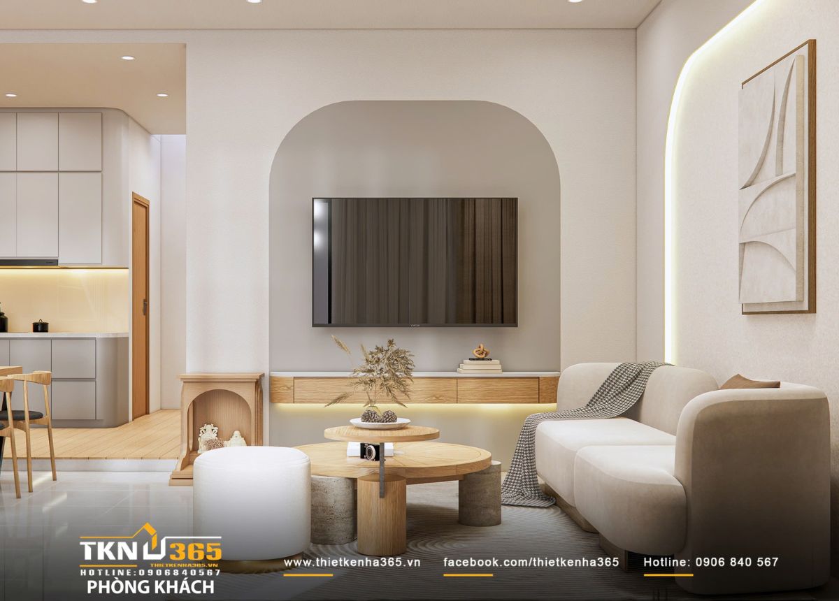 Thiết kế nội thất nhà phố 2 tầng ở Bình Dương: Gọn gàng và đủ đầy 2 Phòng khách tối giản với mảng tường cong và ánh sáng viền dịu nhẹ