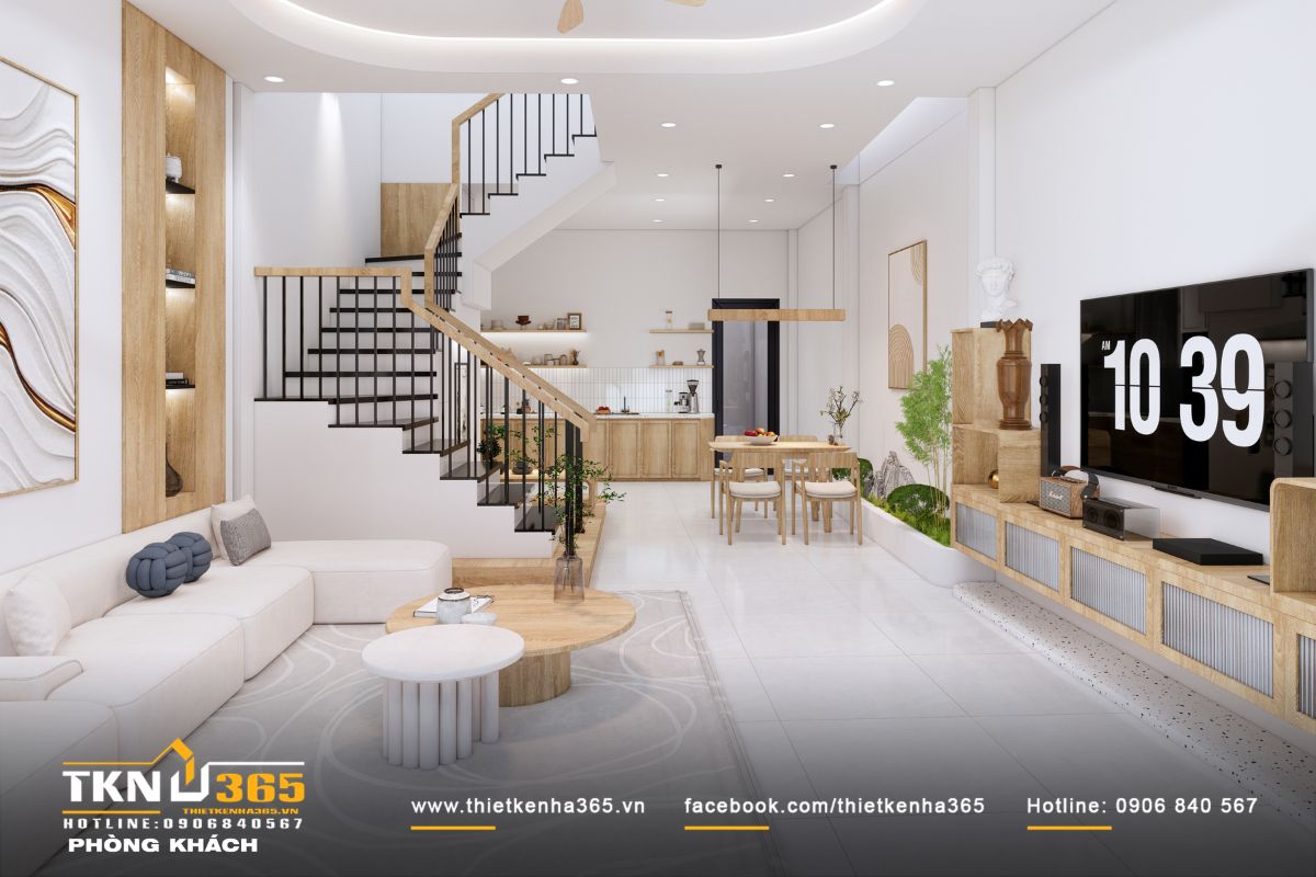 Trục liên thông phòng khách - cầu thang - bếp ăn hài hòa kết hợp với giếng trời giúp lấy sáng tự nhiên thông thoáng