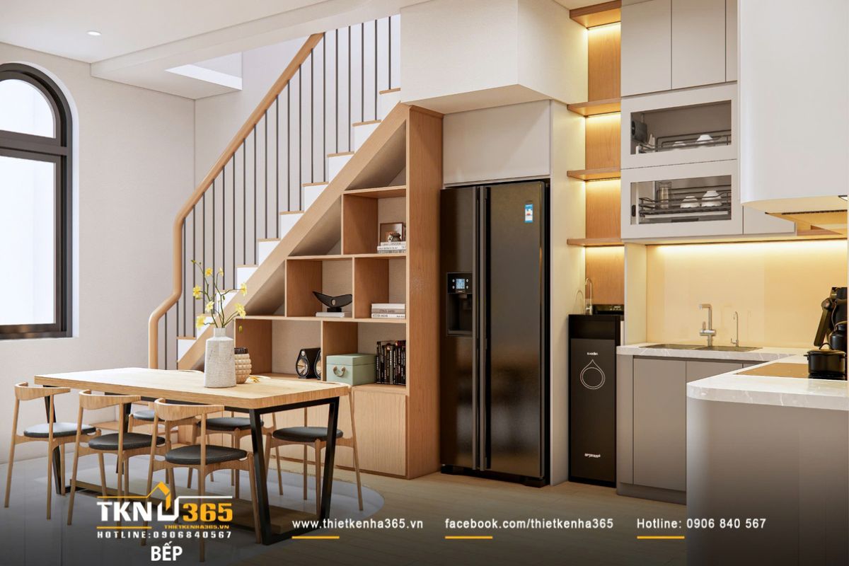 Thiết kế nội thất nhà phố 2 tầng ở Bình Dương: Gọn gàng và đủ đầy 7 Bàn ăn kết nối tự nhiên với khu bếp và cầu thang, tạo dòng lưu thông mạch lạc
