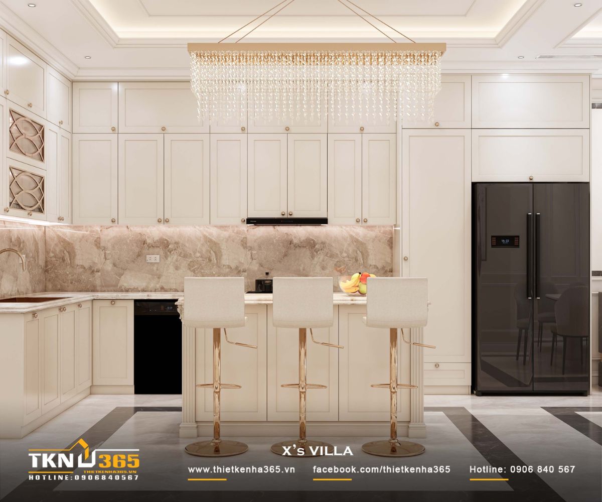 Mặt đá ốp bếp và đảo bếp sử dụng vân tự nhiên, tạo chiều sâu và cảm giác sạch sẽ, dễ bảo trì