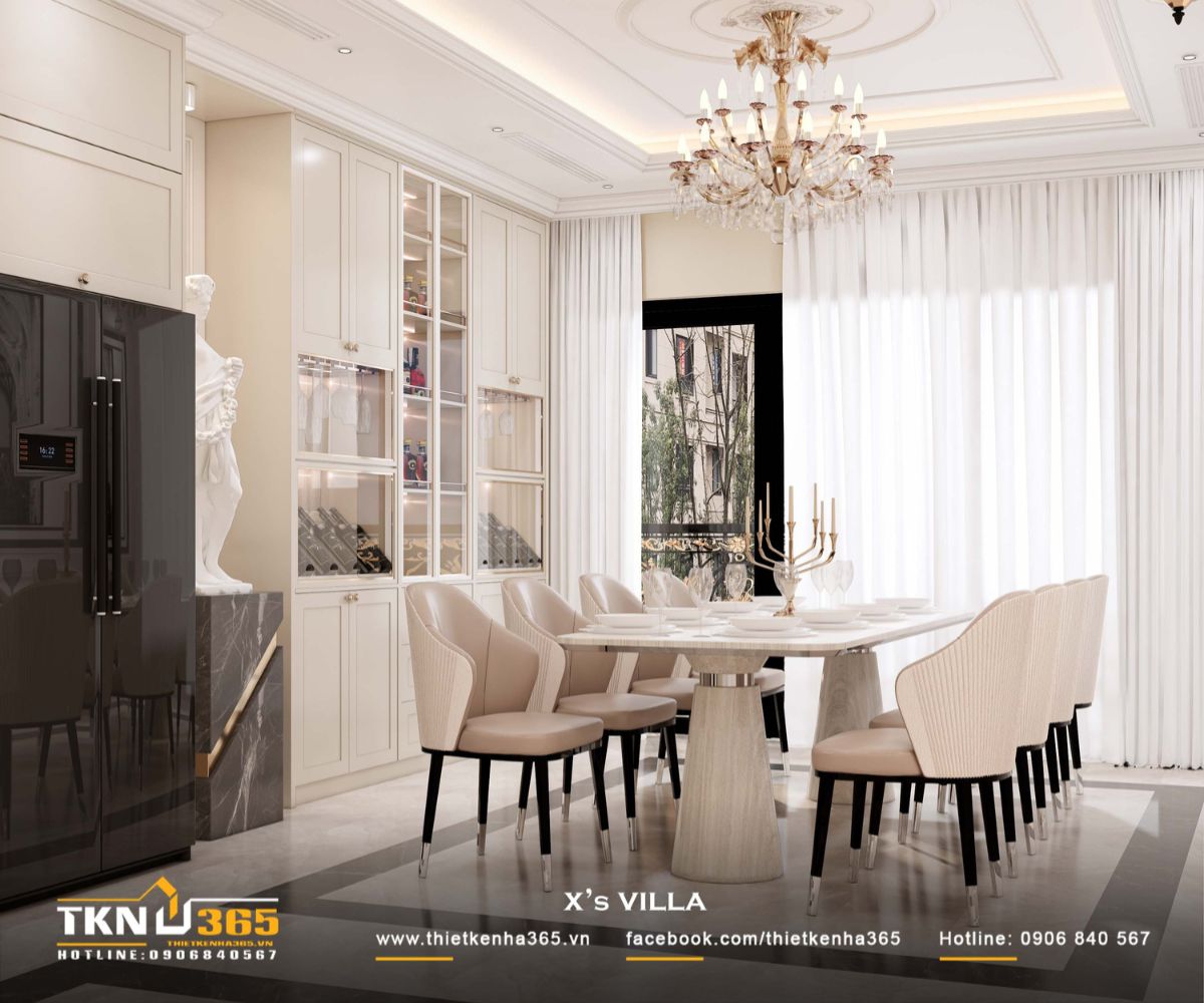 Bàn ăn dài kết hợp ghế bọc nệm sáng màu, duy trì sự cân xứng và nhịp điệu ổn định cho không gian sinh hoạt chung