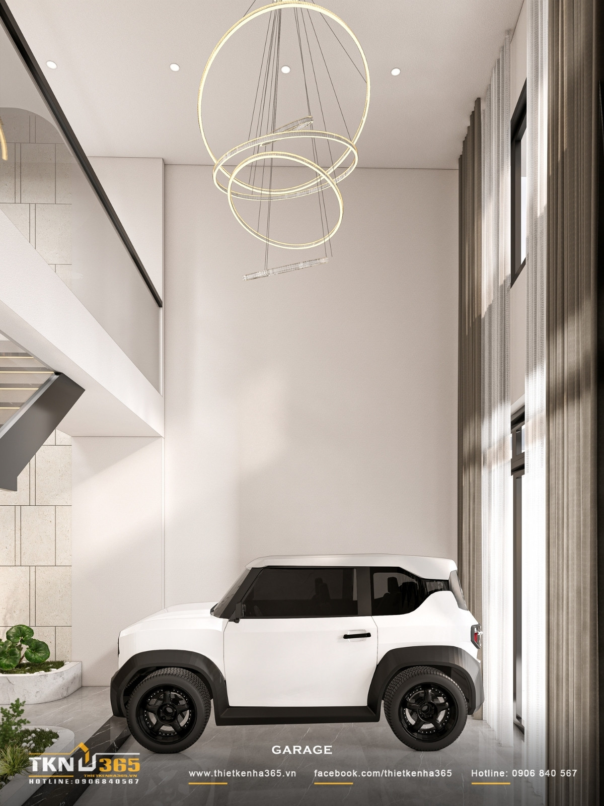 Nhà phố 5 tầng hiện đại ở quận 12 và cách giải quyết bài toán diện tích trên lô đất hẹp ngang 12 Sân trước và garage được thiết kế như một lớp đệm không gian, kết hợp sàn đá trung tính, mảng xanh thấp và ánh sáng hắt nền