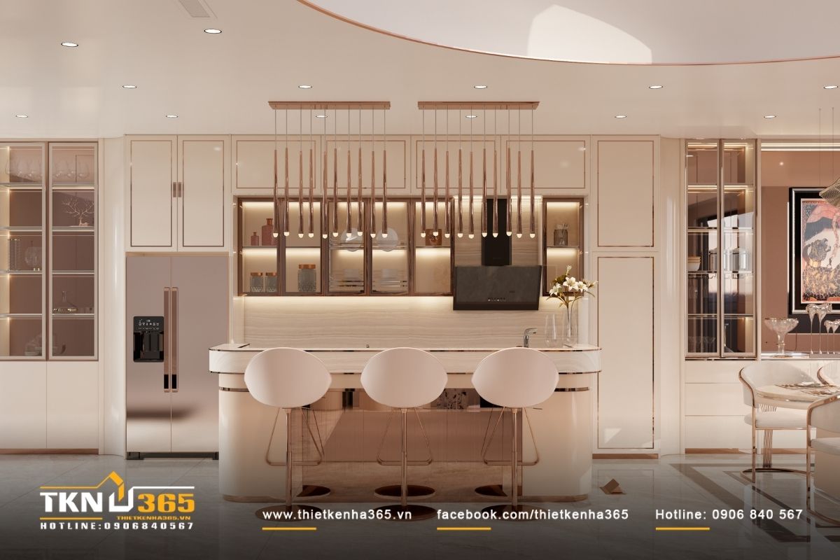 Bảng vật liệu trung tính ấm với be - kem - nâu nhạt, kết hợp ánh kim champagne và đồng xước tiết chế, giữ vẻ sang trọng ổn định theo thời gian
