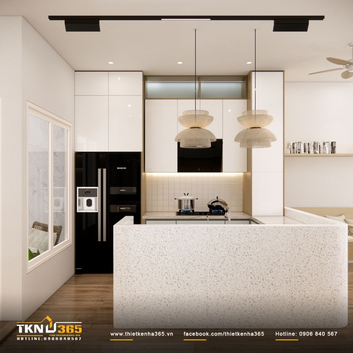 Thiết kế bếp mở giữ sự liên tục về thị giác, giúp ánh sáng tự nhiên lan tỏa khắp tầng trệt nhà phố