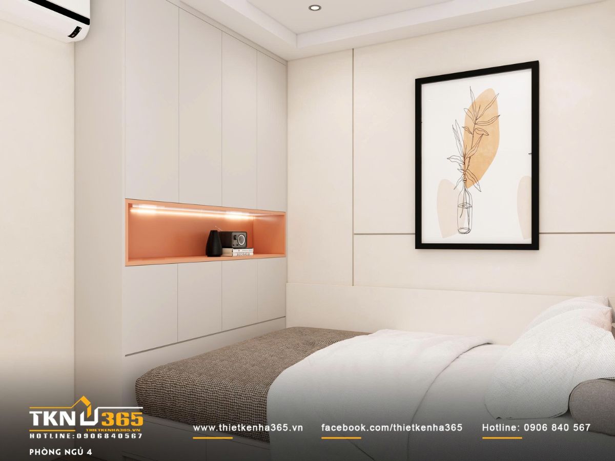Mảng tường và hốc trang trí xử lý gọn gàng, tạo chiều sâu thị giác cho phòng ngủ diện tích vừa phải