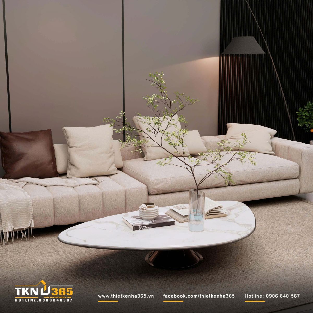 Sofa và bàn trà tương phản tinh tế giữa chất liệu vải thô, da nâu và mặt đá vân nhẹ, mang lại cảm giác ấm áp và cân bằng thị giác