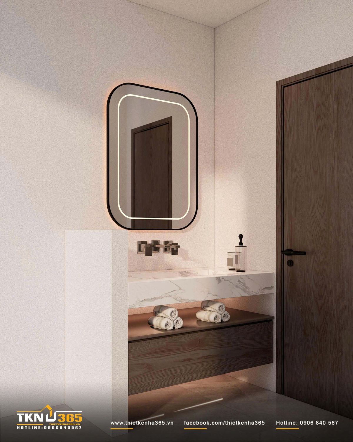 Gương bo góc viền đen tích hợp đèn LED tạo lớp sáng mềm mại, hoàn thiện cảm giác thư giãn cho không gian phòng tắm