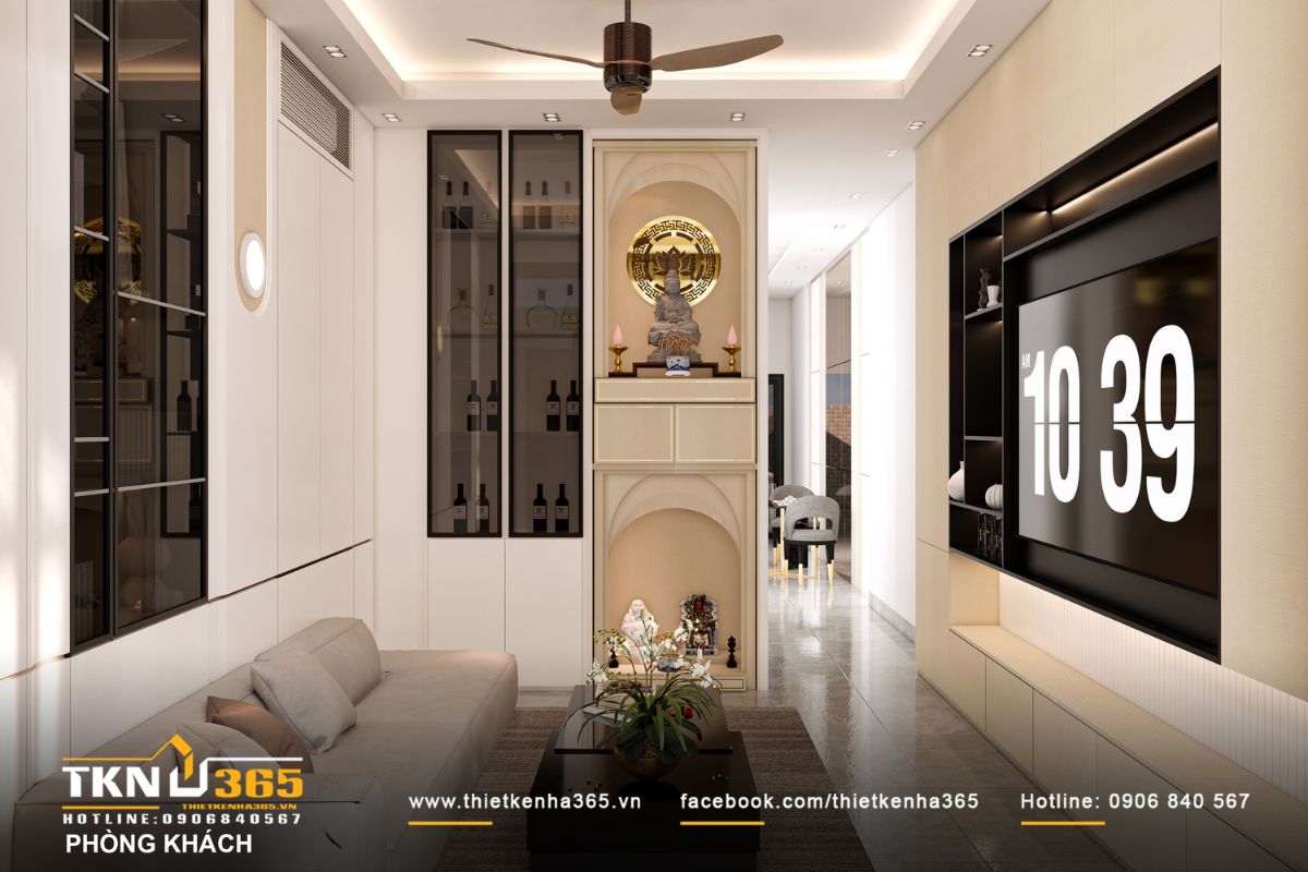 Không gian phòng khách tổ chức theo trục dọc mở, liên thông bếp - ăn, trong khi khu thờ được đặt trang trọng ở trung tâm như điểm tựa tinh thần của cả gia đình