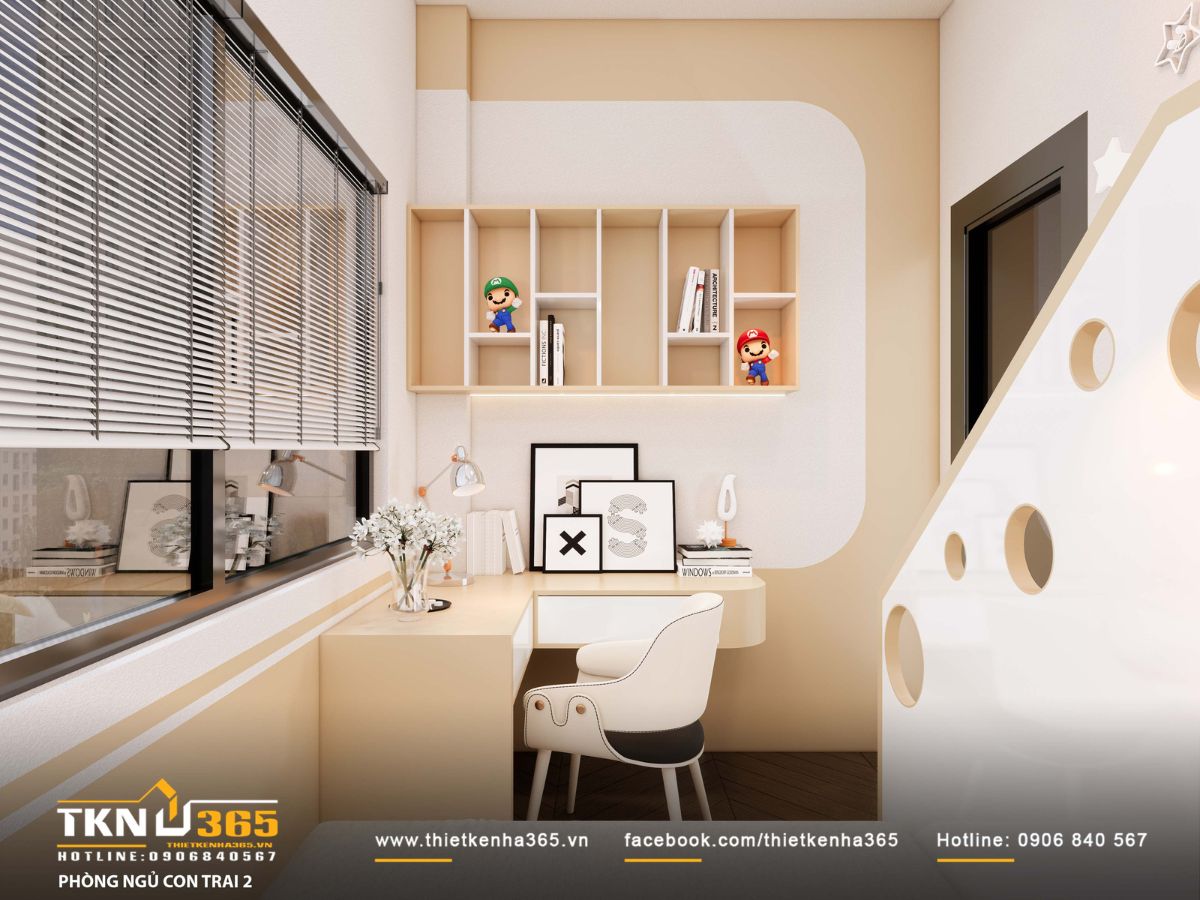 Bàn học bố trí sát cửa sổ, kết hợp kệ treo gọn gàng, đảm bảo ánh sáng tự nhiên và hình thành thói quen học tập ngăn nắp cho trẻ