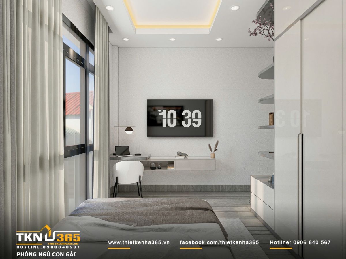 Thiết kế nội thất nhà phố mặt tiền 3m - Giải quyết bài toán ánh sáng và tổ chức không gian hẹp 11 Không gian bàn học đặt cạnh cửa sổ lớn, tận dụng ánh sáng tự nhiên, giúp phòng ngủ con luôn sáng và thoáng
