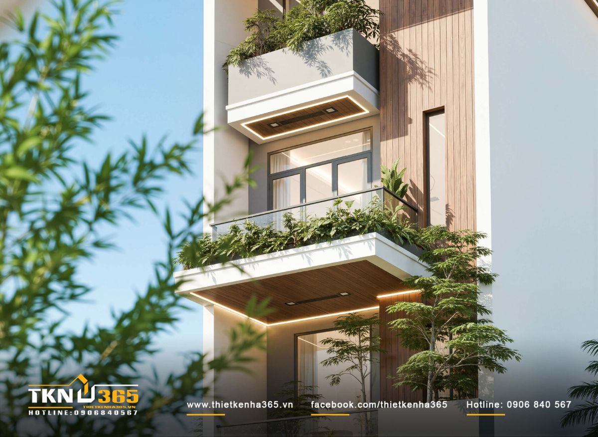 Ban công kính và hệ cây xanh nhiều tầng giúp mặt tiền nhà phố 4 tầng 4x18m trở nên mềm mại và sinh động