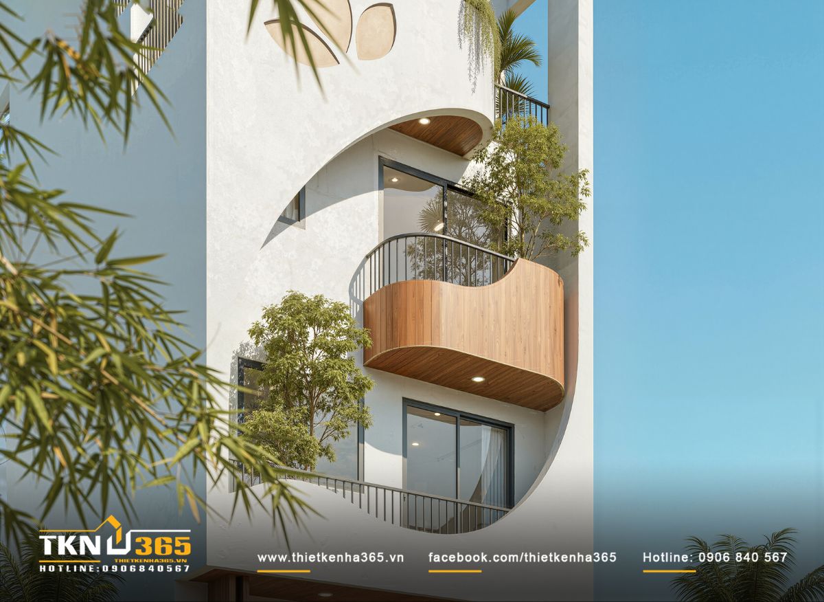 Thiết kế nhà phố 4 tầng tại Kiên Giang “thấu hiểu” nếp sinh hoạt của từng thành viên trong gia đình 5 Ban công cong cùng mảng cây xanh mang lại cảm giác mềm mại cho thiết kế mặt tiền nhà phố 4 tầng