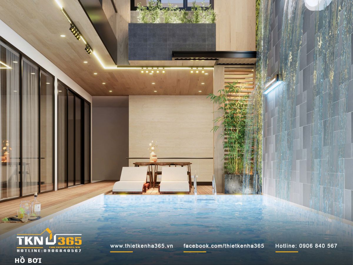 Thiết kế nội thất biệt thự phố 2 tầng H’S House : Không gian sống cân bằng giữa tiện nghi và vi khí hậu 5 Hồ bơi và tường nước thể hiện rõ vai trò trung tâm điều tiết vi khí hậu của toàn bộ công trình