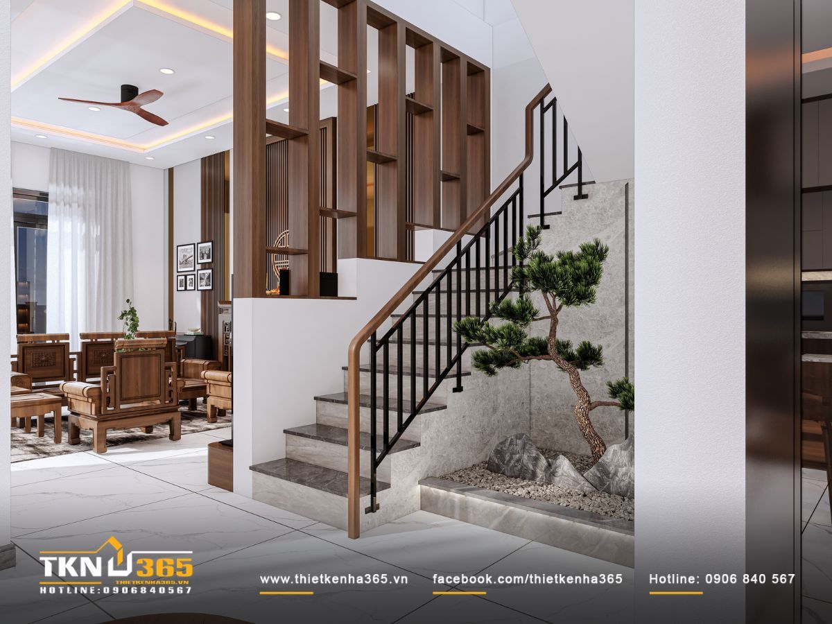 Cầu Thang Giữa Nhà Có Tốt Không? Phong Thủy, Thiết Kế & Cách Bố Trí Hợp Lý 9 Gia chủ có thể sử dụng lam gỗ hoặc vách ngăn thay cho tường đặc để phân chia cầu thang và khu vực sinh hoạt chính