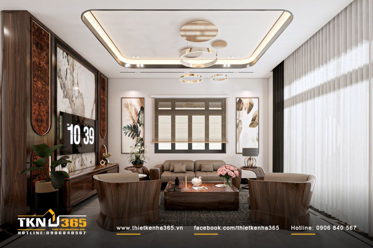 Hệ cửa kính lớn cùng rèm hai lớp giúp ánh sáng tự nhiên lan tỏa nhẹ nhàng khắp khu vực sinh hoạt chung