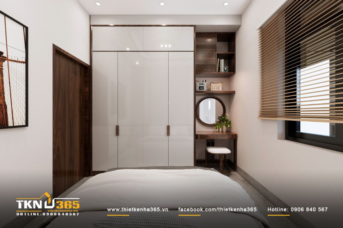 Tủ quần áo phối trắng bóng và gỗ nâu trầm góp phần cân bằng giữa sự hiện đại và cảm giác ấm áp trong không gian nghỉ ngơi