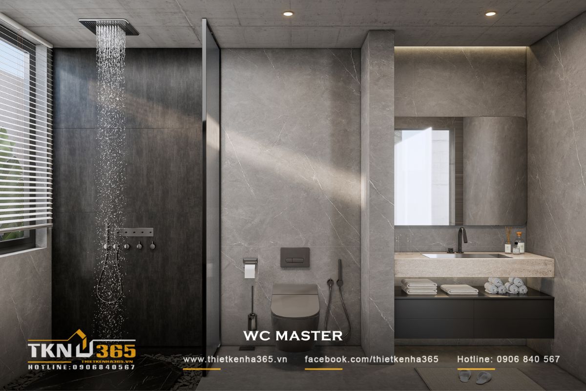 Nhà phố 1 tầng 8x15m biến khoảng sân rộng thành không gian nghỉ dưỡng mỗi ngày 42 WC master sử dụng bảng màu xám đồng nhất từ trần, tường đến sàn, kết hợp vách kính để phân chia khu tắm mà vẫn giữ không gian liền mạch