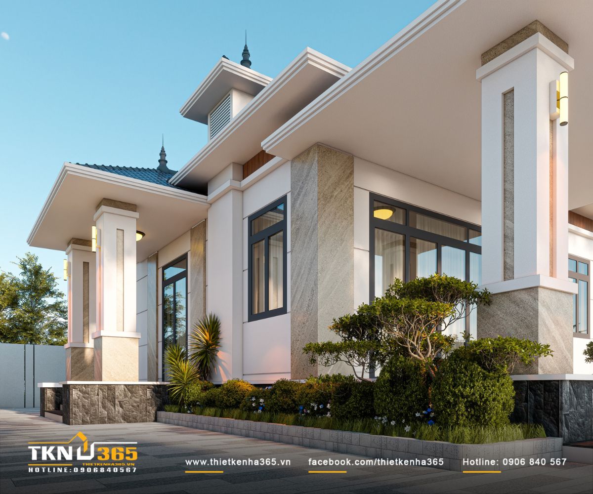 Hiên rộng, hệ cột vuông và khoảng xanh chạy quanh chân nhà phố 1 tầng tạo lớp chuyển tiếp thoáng trước các không gian sinh hoạt bên trong