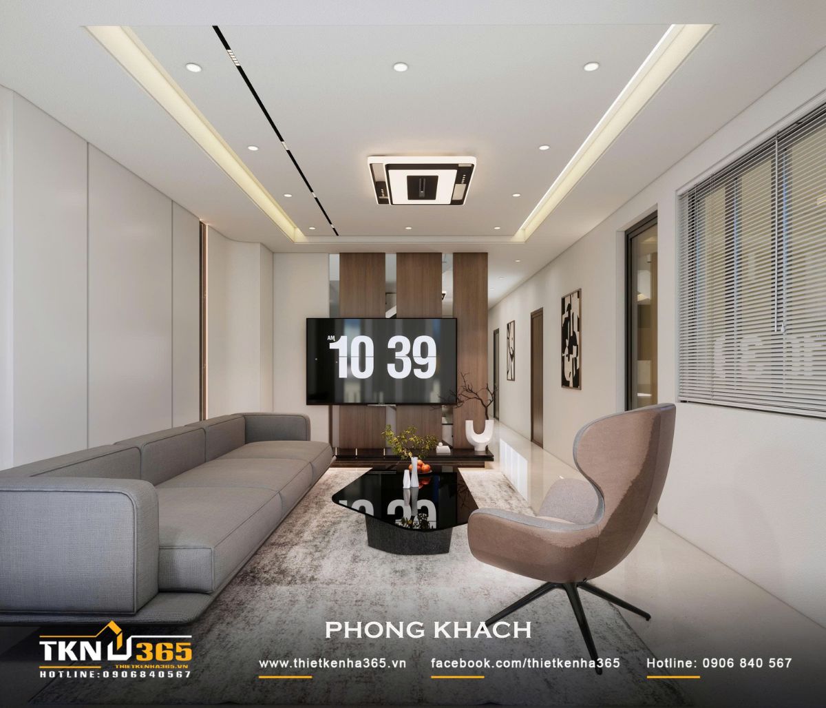 Nhà phố 2 tầng hiện đại của chị Hương tích hợp quán cà phê nhưng vẫn giữ sự riêng tư cho gia đình đông thành viên 10 Phòng khách nhà phố 2 tầng sử dụng sofa xám và vách tivi ốp gỗ, tạo bố cục hiện đại và gọn gàng