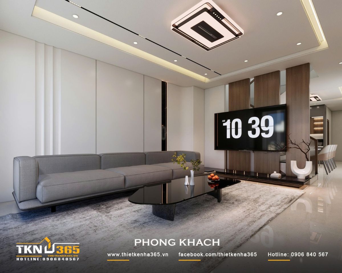 Nhà phố 2 tầng hiện đại của chị Hương tích hợp quán cà phê nhưng vẫn giữ sự riêng tư cho gia đình đông thành viên 12 Vách tivi gỗ được thiết kế thanh mảnh, tạo sự phân tách tương đối giữa phòng khách và khu vực phía sau