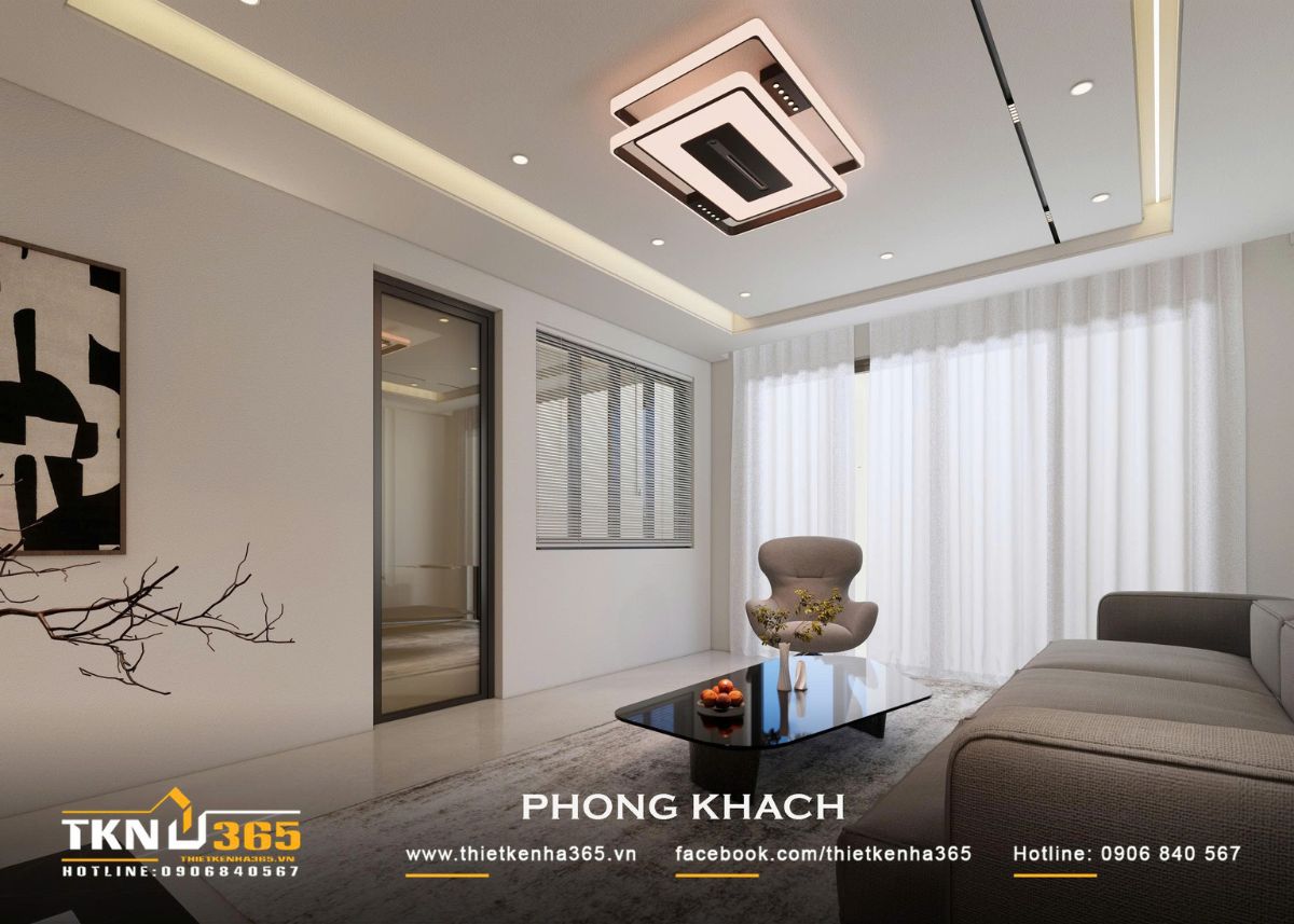 Nhà phố 2 tầng hiện đại của chị Hương tích hợp quán cà phê nhưng vẫn giữ sự riêng tư cho gia đình đông thành viên 15 Hệ đèn âm trần và đèn hắt chạy quanh trần bổ sung ánh sáng dịu cho không gian phòng khách