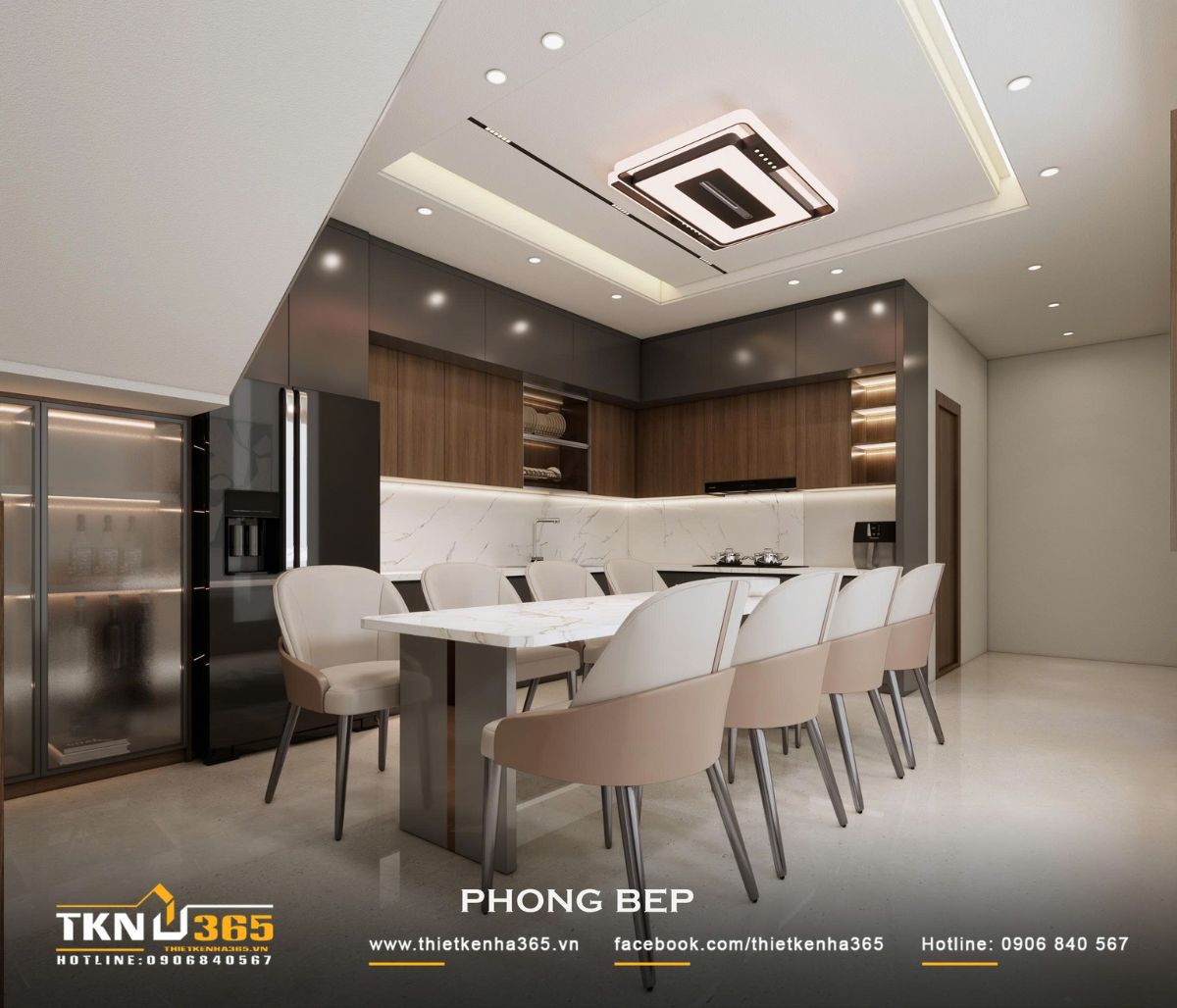 Nhà phố 2 tầng hiện đại của chị Hương tích hợp quán cà phê nhưng vẫn giữ sự riêng tư cho gia đình đông thành viên 19 Gam xám đậm, vân gỗ nâu và mặt đá sáng màu tạo sự tương phản hài hòa cho khu bếp - ăn hiện đại