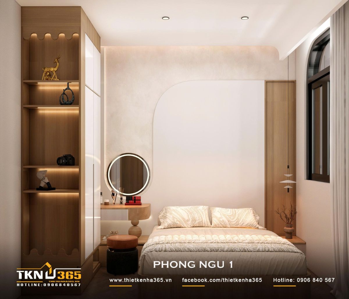 Phòng ngủ 1 tận dụng hệ tủ cao sát trần kết hợp bàn trang điểm và kệ trang trí, giúp các chức năng cần thiết được gom gọn trong diện tích vừa phải