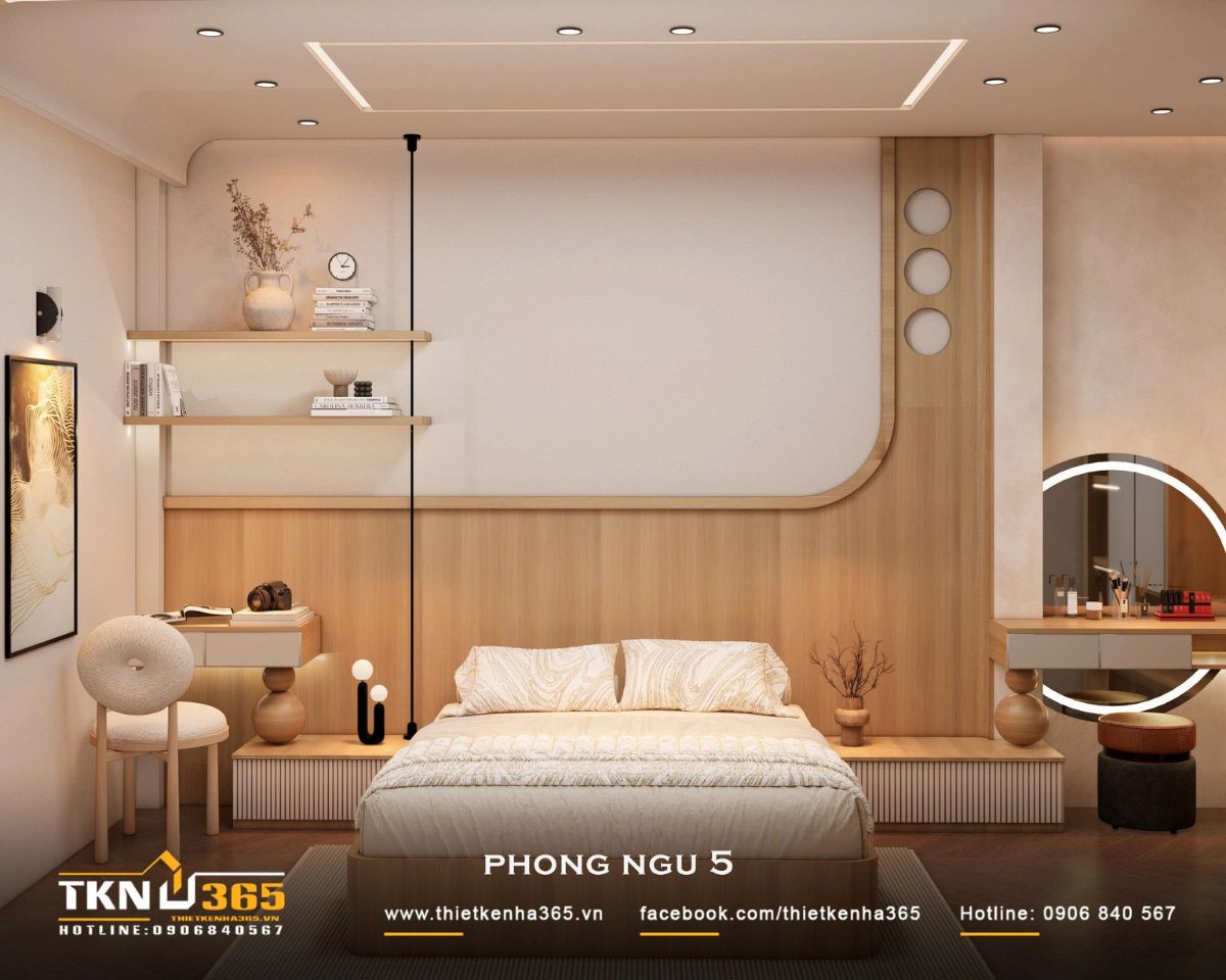 Phòng ngủ 5 mở rộng mảng đầu giường thành một hệ nội thất liên tục, kết hợp bàn nhỏ, kệ trang trí và bàn trang điểm ở hai bên
