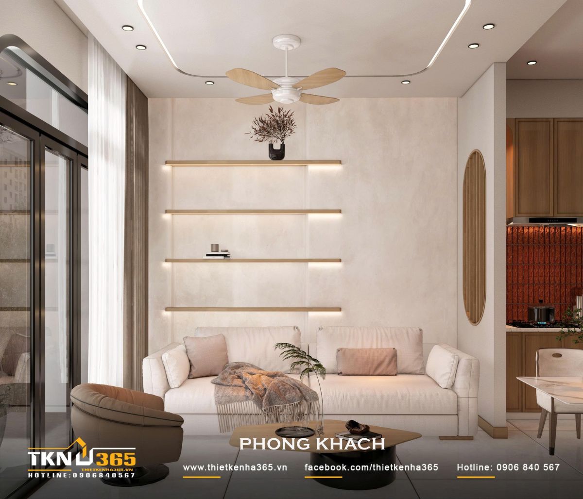 Phòng khách nhà phố 2 tầng sử dụng bảng màu trắng kem và gỗ sáng, tạo cảm giác nhẹ nhàng cho khu vực sinh hoạt chung